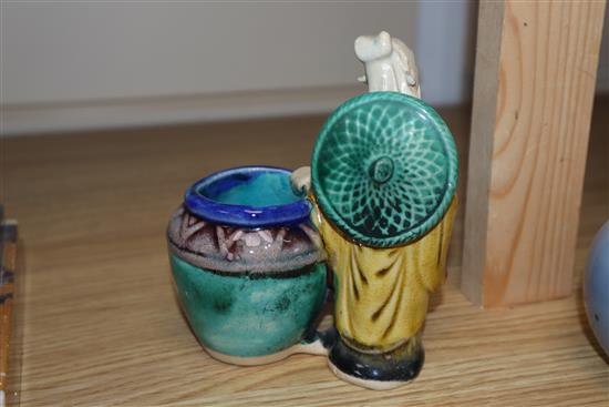 A Chinese blue glazed bottle vase, Kangxi mark but Republic period and a Chinese pottery figure tallest 12cm
